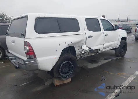 2013 Toyota Tacoma Base V6 z USA, uszkodzony, nr VIN 3TMLU4EN9DM113624